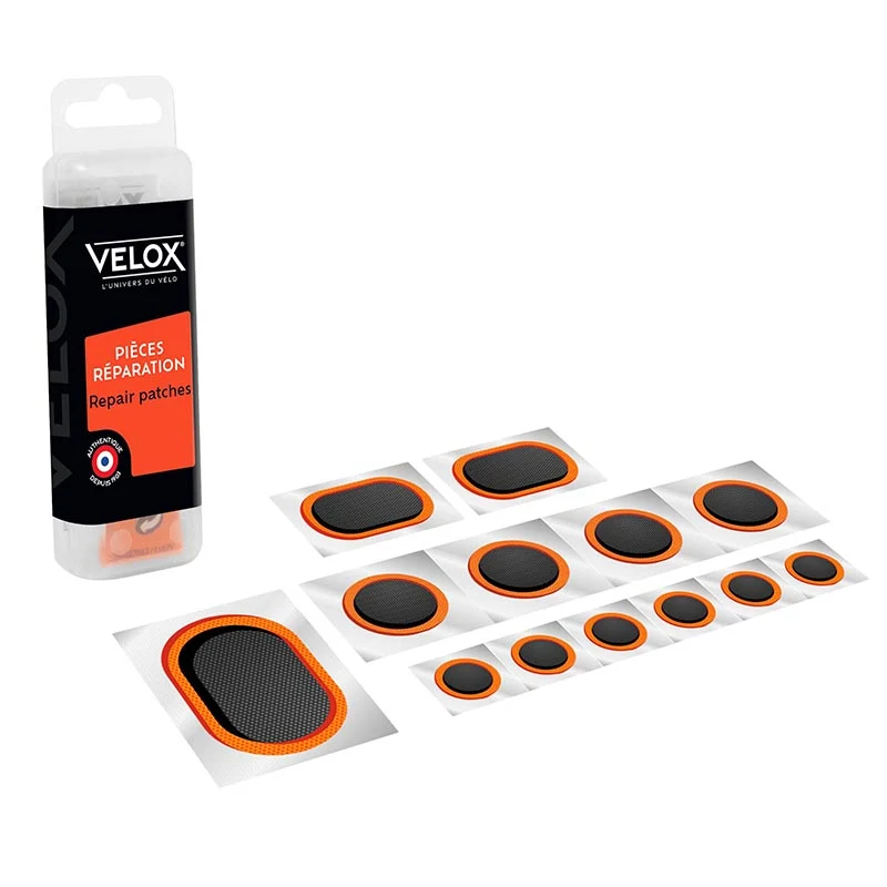 Kit Réparation Chambre A Air Velox Route Autocollantes - Boite (6 Patchs 15 mm + 4 Patchs 25 mm + 2 Patchs 24X34 mm + 1 Patch 32X50 mm)