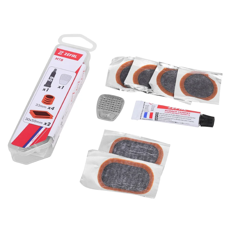 Kit Réparation Pneu Tubeless VTT Zefal Par L'Intérieur Avec Rustines - Boite (4 Patchs 33 mm + 2 Patchs 50X30 mm + Colle 5G + Rape Acier) Avec Notice